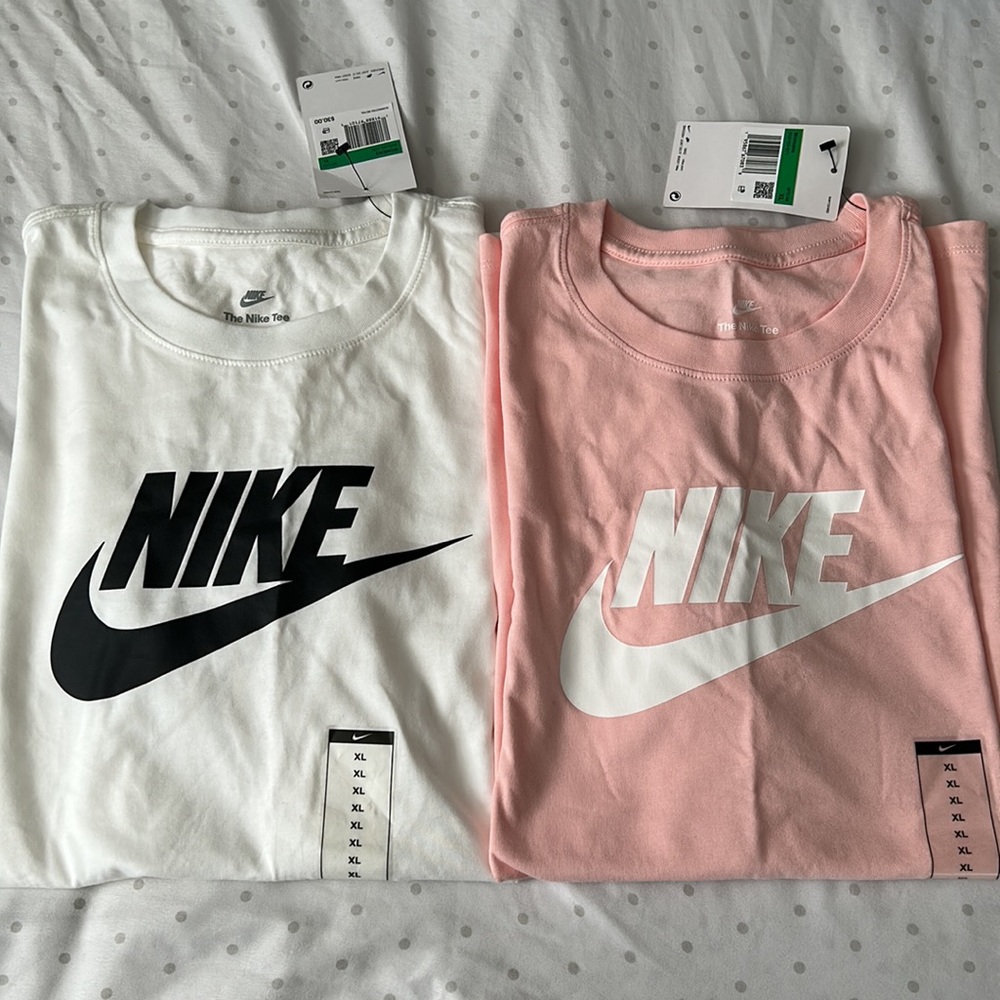 Two Nike’s Tops